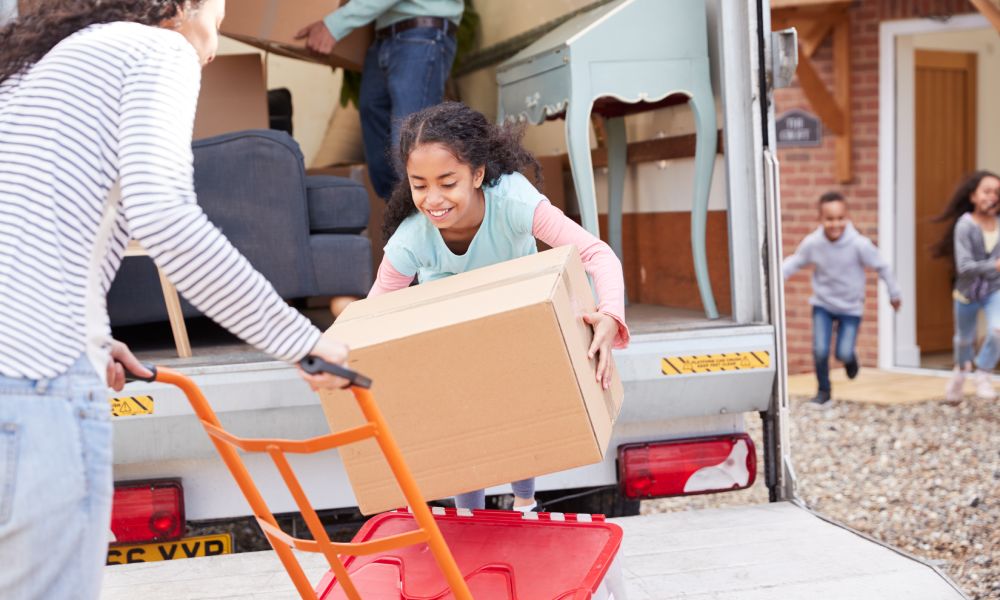 Family unloading furniture