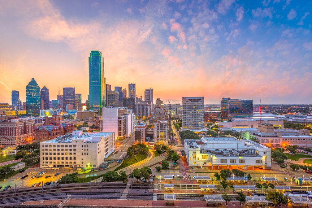 Dallas, Texas, USA downtown city skyline at dusk.