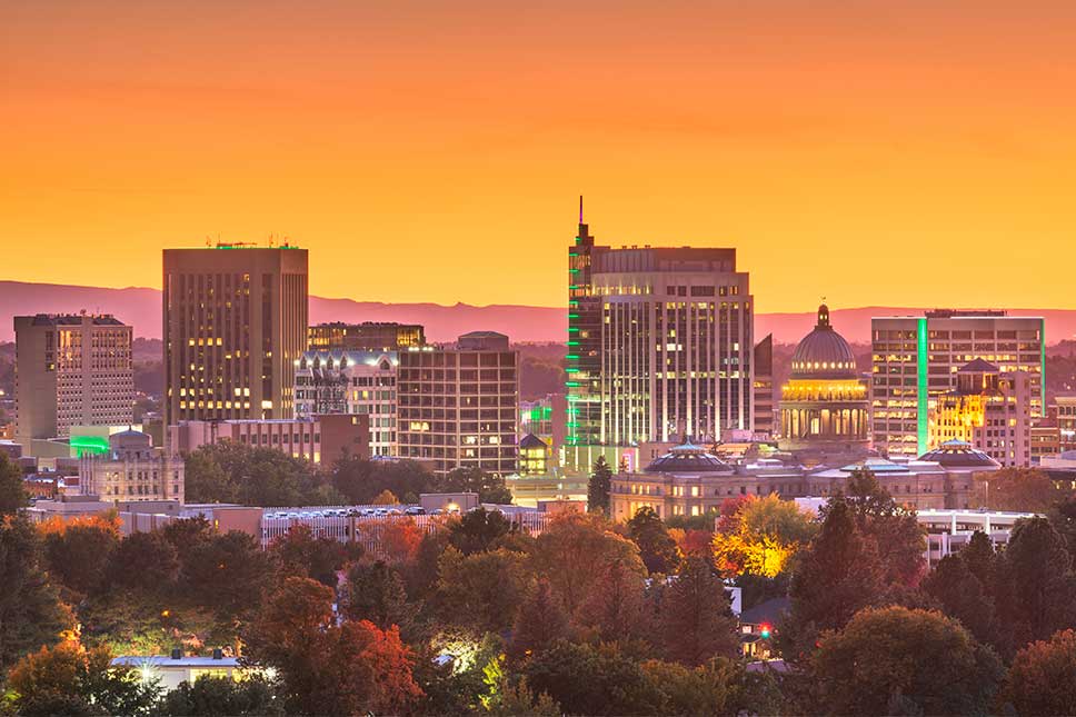 The skyline includes iconic buildings such as the Idaho State Capitol, which is notable for its dome.